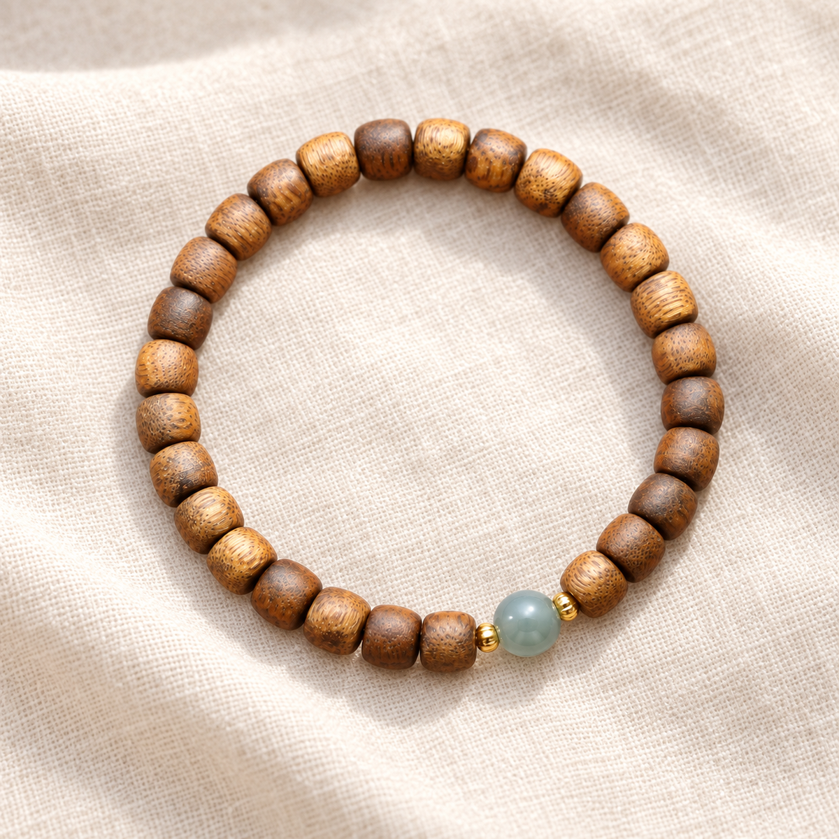 Blue-Green Accent Agarwood Barrel Bead Bracelet