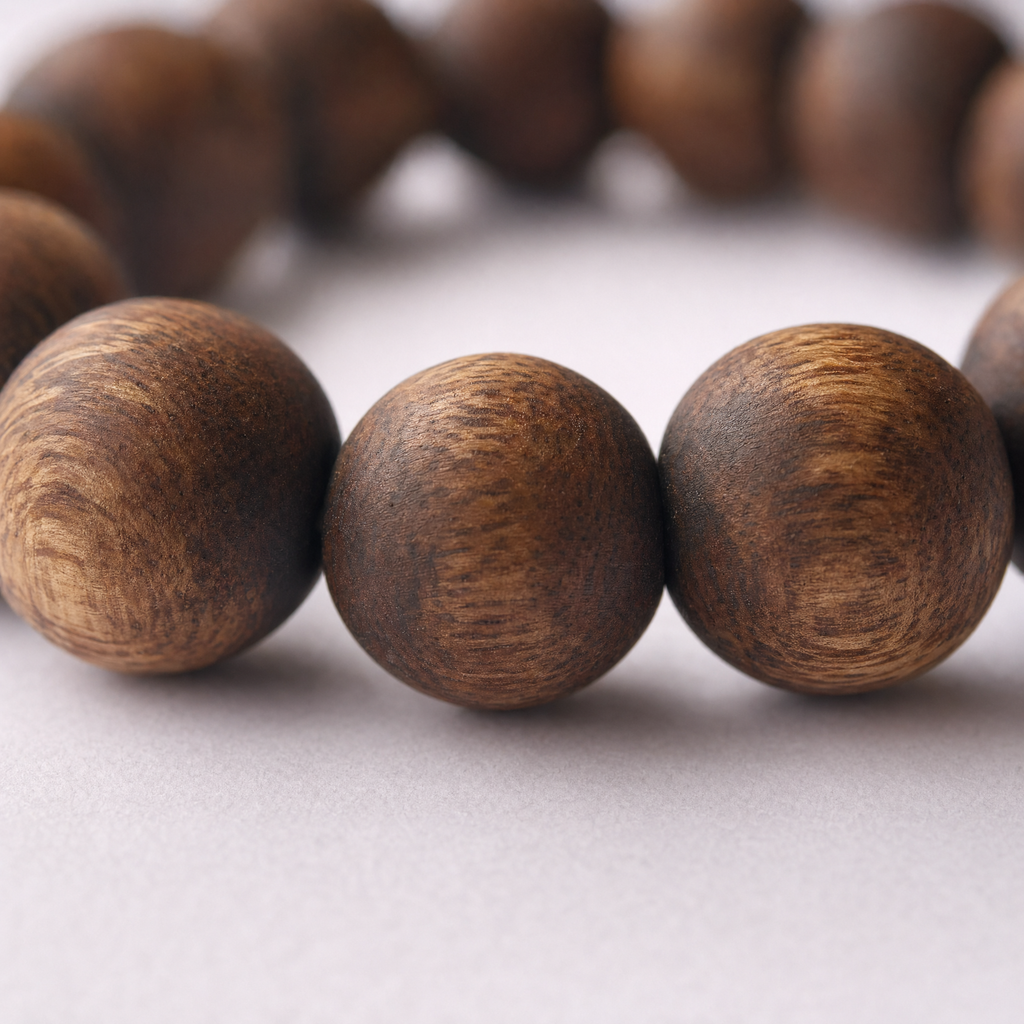 Close-up of classic round agarwood beads