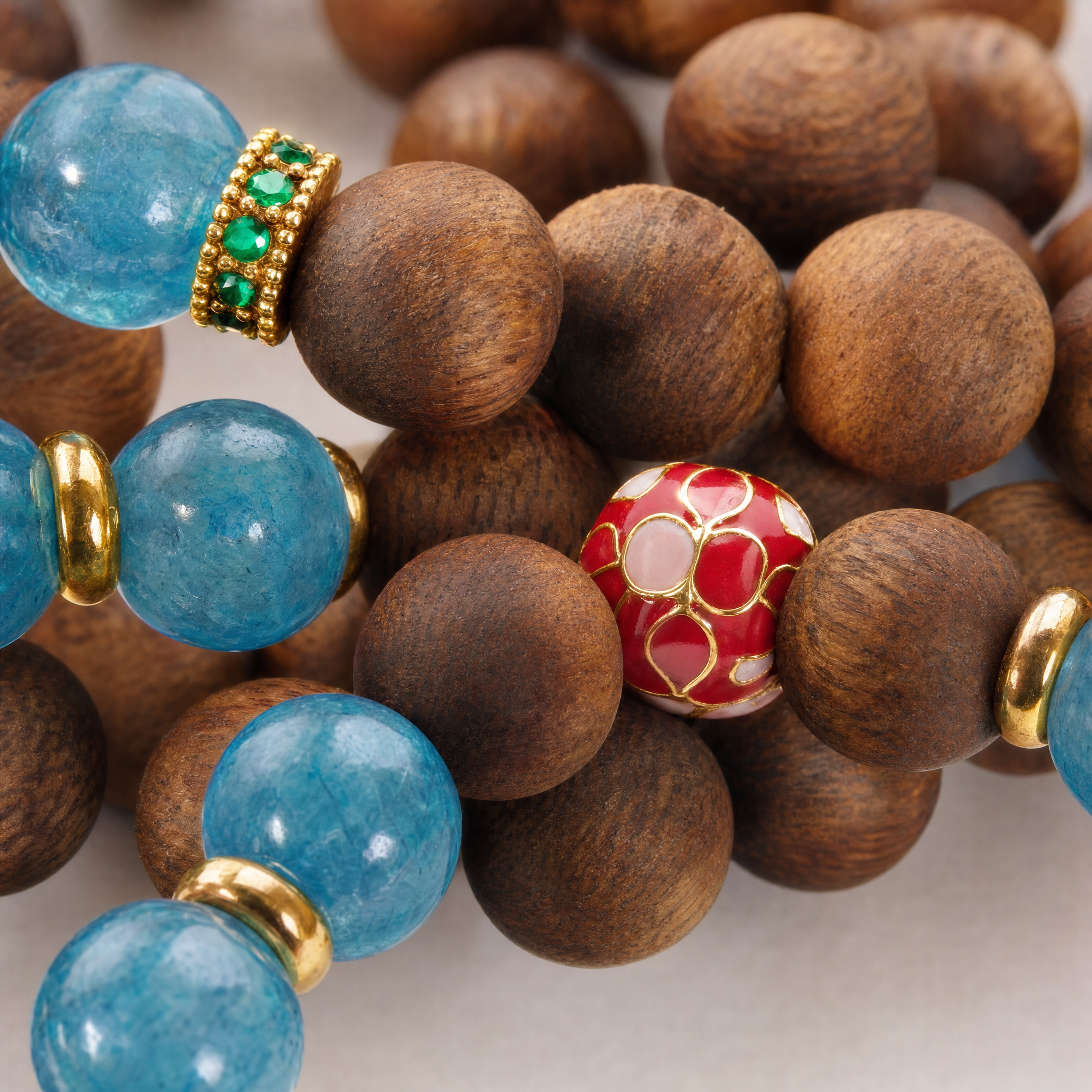 Close-up of double wrap agarwood bracelet with blue accent beads