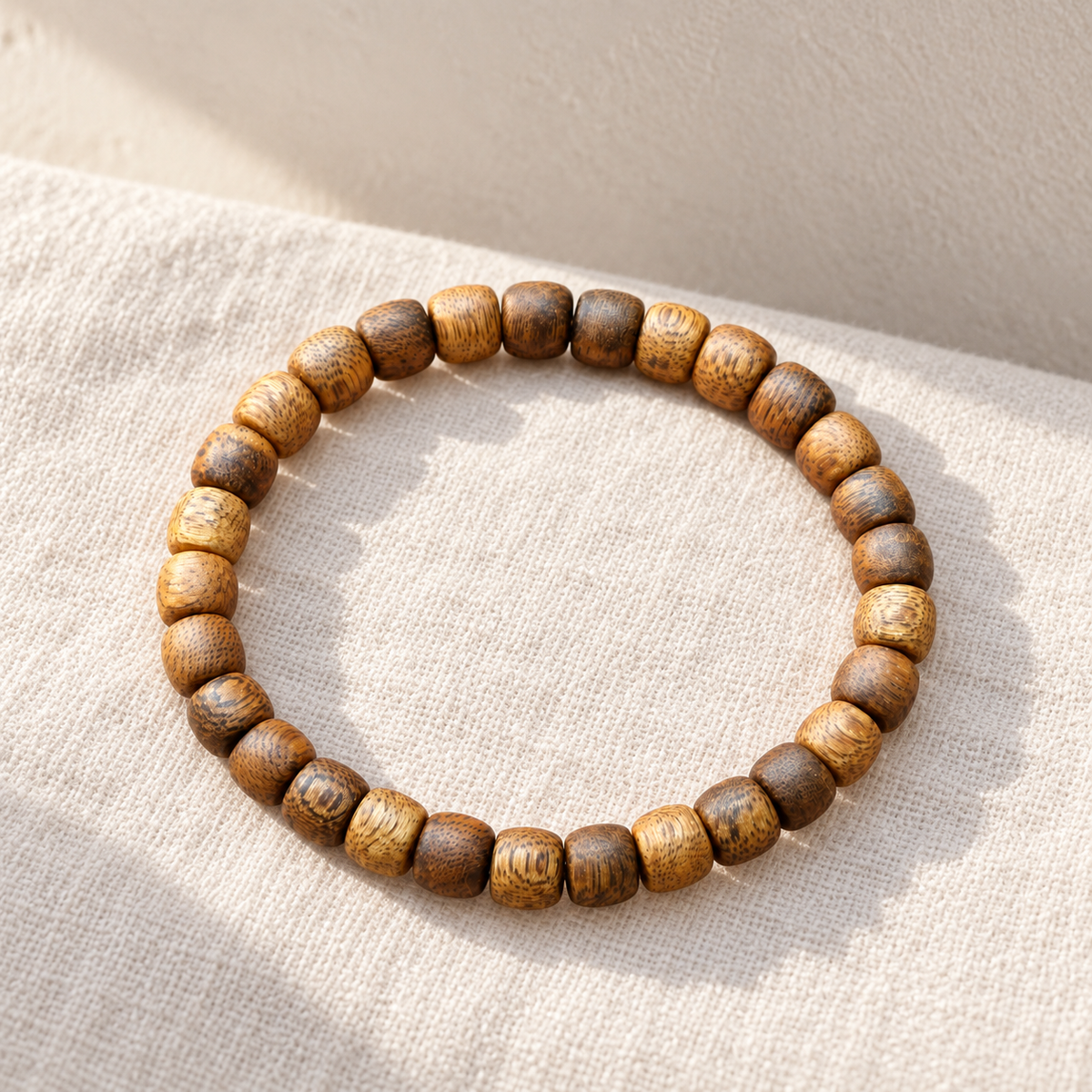 Classic Agarwood Barrel Bead Bracelet — styled still life in natural light