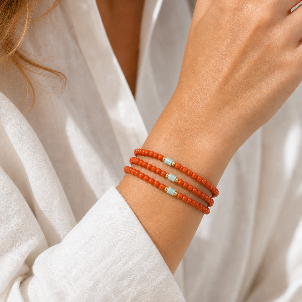 Double Wrap Nanhong Red Agate Cord Bracelet worn as a three-loop wrap bracelet